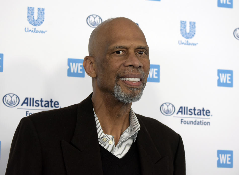 FILE - Kareem Abdul-Jabbar arrives at WE Day California at The Forum on Thursday, April 25, 2019, in Inglewood, Calif. Kareem Abdul-Jabbar has revealed that he received the COVID-19 vaccine and is encouraging others to consider doing the same. The Basketball Hall of Famer and NBA’s leading all-time scorer has taped a short message that will be aired beginning Monday during broadcasts of games played on the Martin Luther King Jr. Day holiday. (Photo by Richard Shotwell/Invision/AP)