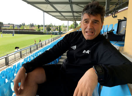 FIFA's head of refereeing, Massimo Busacca, explains the benefits of the video replay system during an interview with Reuters, held during a seminar for World Cup referees in Florence, Italy April 19, 2018. REUTERS/Brian Homewood