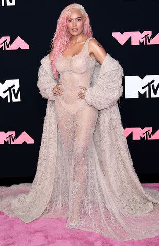 <p>Dimitrios Kambouris/Getty</p> Karol G attends the 2023 MTV Video Music Awards on Sept. 12, 2023.