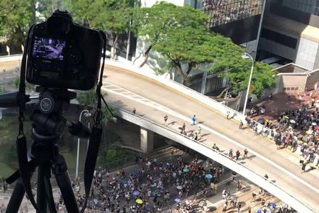 A Reuters camera overlooks the route of a pro-democracy march in Hong Kong