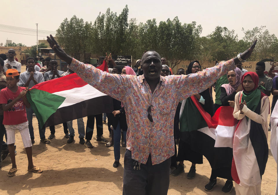 A Sudanese protester shouts slogans during a demonstration against the military council, in Khartoum, Sudan, Sunday, June 30, 2019. Tens of thousands of protesters have taken to the streets in Sudan's capital and elsewhere in the country calling for civilian rule nearly three months after the army forced out long-ruling autocrat Omar al-Bashir. The demonstrations came amid a weekslong standoff between the ruling military council and protest leaders. (AP Photo/Hussein Malla)