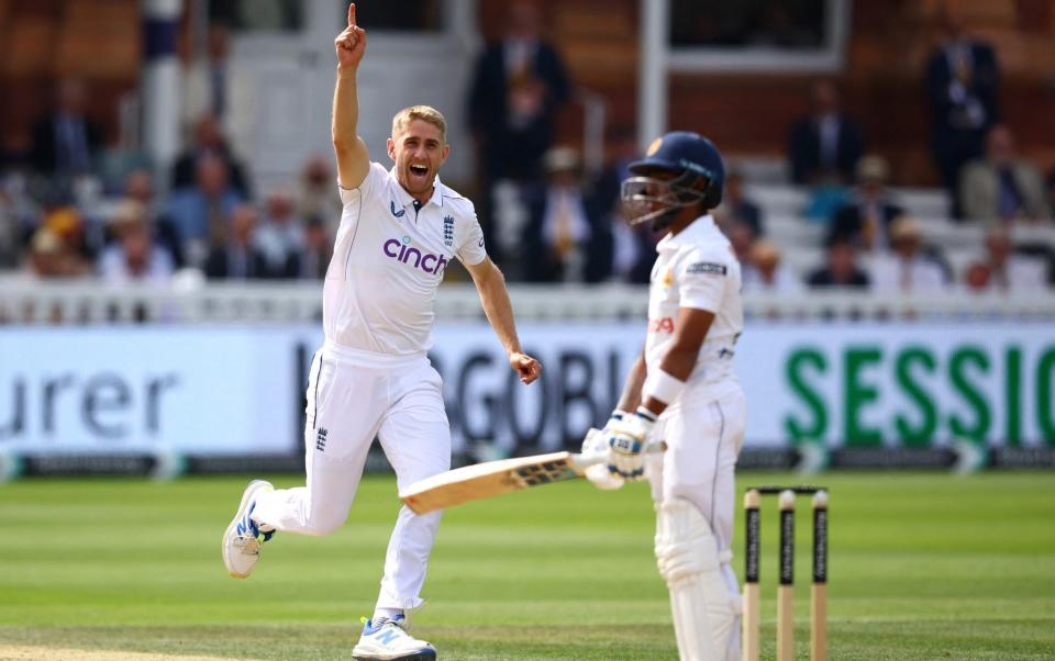 Olly Stone celebrates taking a wicket after Sri Lanka's Pathum Nissanka is caught by England's Matthew Potts