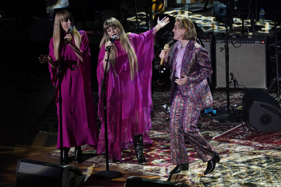 Brandi Carlile, right, performs with Lucius at the Americana Honors & Awards show Wednesday, Sept. 14, 2022, in Nashville, Tenn. (AP Photo/Mark Humphrey)