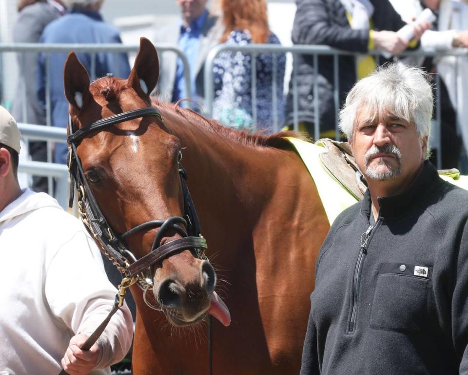 Trainer Steve Asmussen, right, assists with paddock schooling for Disarm on Tuesday at Churchill Downs. Asmussen has a record 24 Kentucky Derby starters without a win.