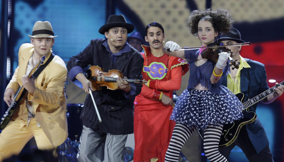 FILE - Czech Republic's band Gipsy.cz performs during the Eurovision Song Contest's first semifinal at the Olympic Stadium in Moscow, Russia, May 12, 2009. The 68th Eurovision Song Contest is taking place in May in Malmö, Sweden. It will see acts from 37 countries vie for the continent’s pop crown. Founded in 1956, Eurovision is a feelgood extravaganza that strives to banish international strife and division. It’s known for songs that range from anthemic to extremely silly, often with elaborate costumes and spectacular staging. (AP Photo/Sergey Ponomarev, File)