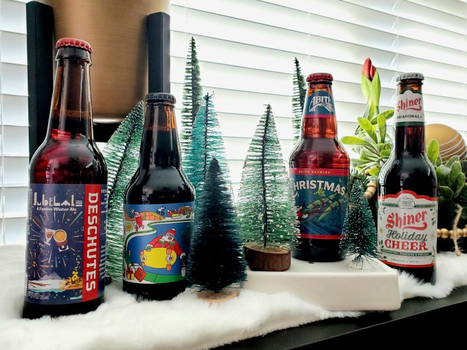 Some of the Christmas beers available in 2023: From right to left, Jubelale, a winter ale from Deschutes Brewing in Bend, Ore.; Christmas Bomb!, an imperial stout from Prairie Artisan Ales in Oklahoma City; Christmas Ale, a brown ale from Abita Brewing in Covington, La.; and Shiner Holiday Cheer, a Dunkelweizen-style beer from Spoetzl Brewing in Shiner, Texas.
