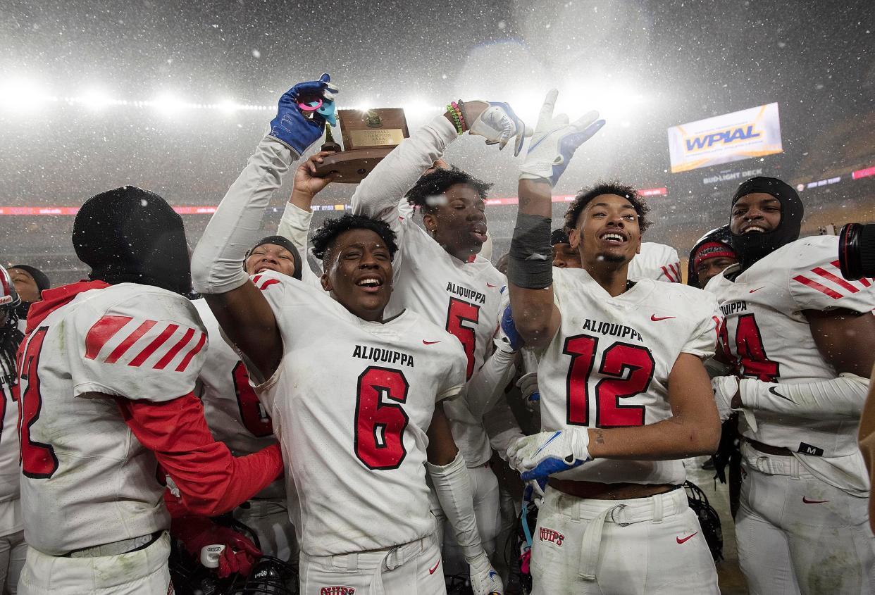 The Quips celebrate their WPIAL Class 4A championship win against Belle Vernon, Saturday at Heinz Field.