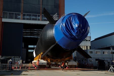 The French Navy vessel called "Suffren", first of the nuclear Barracuda class attack submarines, leaves the workshops of its construction at the Naval Group site in Cherbourg