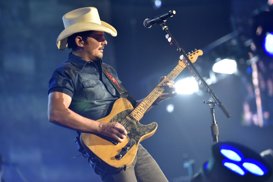 FILE - This Feb. 24, 2018 file photo shows Brad Paisley performing in Rosemont, Ill. Paisley will perform in Live Nation's “Live from the Drive-In,” concert series taking place July 10-12. (Photo by Rob Grabowski/Invision/AP, File)