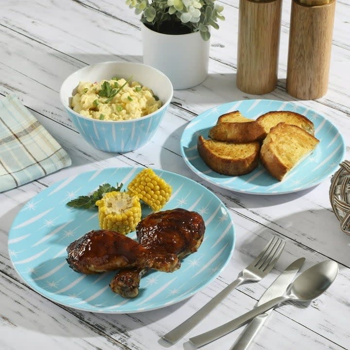 a place setting with food on a table