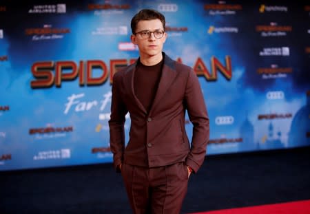 FILE PHOTO: Actor Tom Holland poses at the World Premiere of Marvel Studios' "Spider-man: Far From Home" in Los Angeles