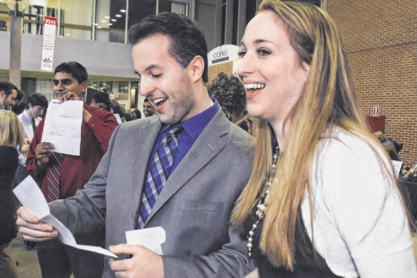 Jessie Hanna (left) of Piscataway and Lauren Joyce Navallo react opening their Match Day letters. Hanna was headed to Mount Sinai Medical Center in New York for psychiatry, and Navallo was headed to Cornell Medical Center in New York for pediatrics.