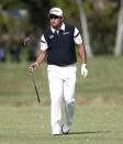 Hideki Matsuyama walks up the eighth fairway during the first round of the Sony Open PGA Tour golf event, Thursday, Jan. 10, 2019, at the Waialae Country Club in Honolulu, Hawaii. (AP Photo/Matt York)