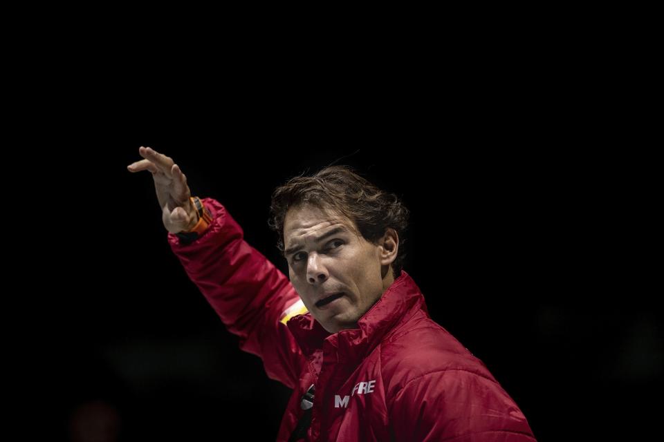 Spain's Davis Cup player Rafael Nadal salutes to supporters in Madrid, Spain, Sunday, Nov. 17, 2019. The 18 teams will play in six groups of three, with the group winners advancing to the knockout stage along with the two best second-place teams. The nations will play within their groups Monday-Thursday, with the knockout rounds Friday-Sunday. The matches will take place on hard courts in three stadiums in morning and afternoon sessions that will include two singles matches and a doubles match. (AP Photo/Bernat Armangue)