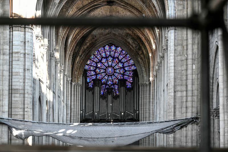 FILE PHOTO: The organ is pictured during preliminary work in the Notre-Dame Cathedral, three months after a major fire, in Paris