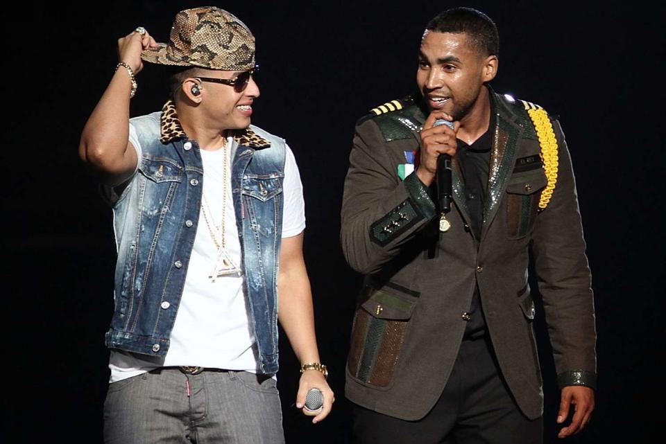 <p>GV Cruz/WireImage</p> Daddy Yankee and Don Omar