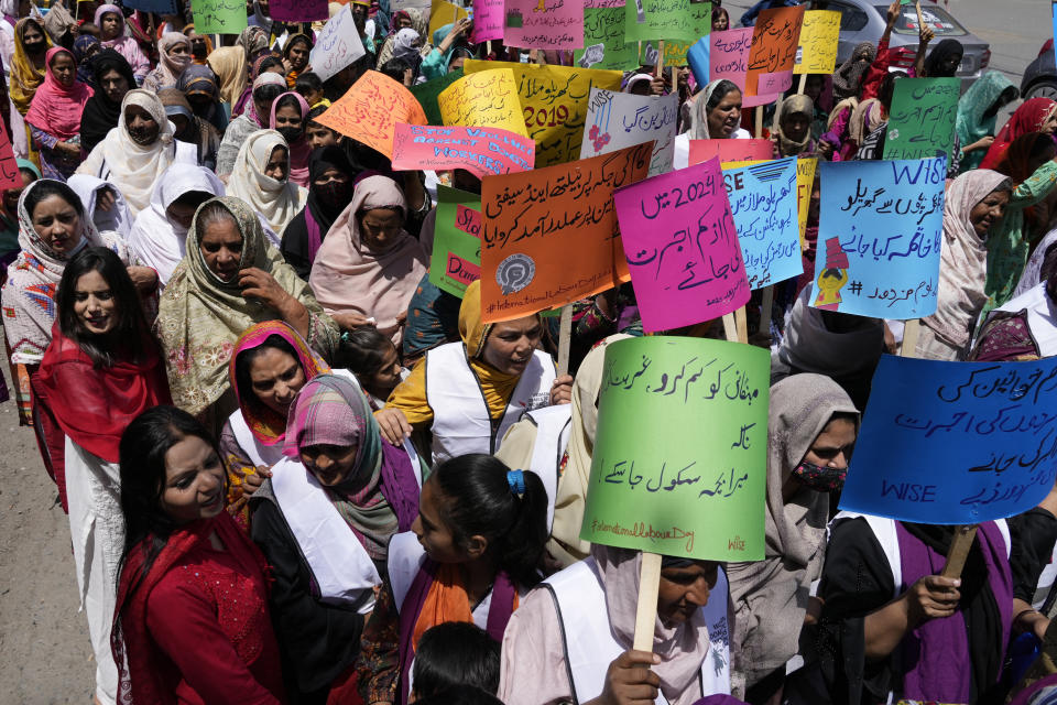 Female workers take part in a May Day rally, marking International Labour Day in Lahore, Pakistan, Wednesday, May 1, 2024. Participants of the rally demand implementation of labor laws and increase in their wages. (AP Photo/K.M. Chaudary)