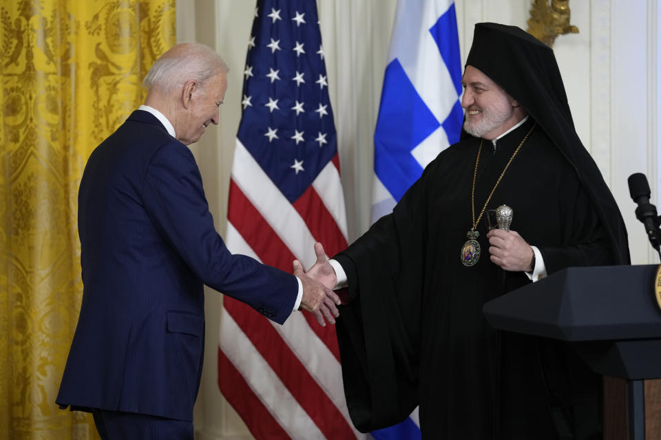 President Joe Biden shakes hands with Archbishop Elpidophoros Lambriniadis of America during a reception in the East Room of the White House in Washington, Wednesday, March 29, 2023, celebrating Greek Independence Day. (AP Photo/Susan Walsh)