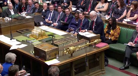 FILE PHOTO: Britain's opposition Labour Party leader Jeremy Corbyn speaks as British Prime Minister Theresa May takes questions in Parliament on her last day in office as Prime Minister in London