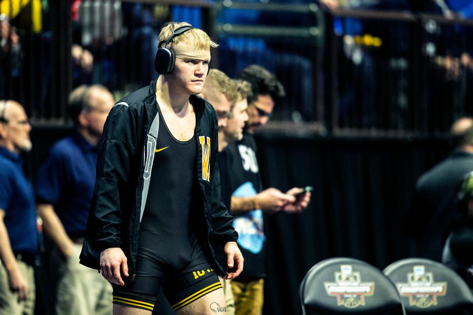 Iowa's Nelson Brands gets ready before wrestling at 174 pounds during the third session of the NCAA Division I Wrestling Championships, Friday, March 17, 2023, at BOK Center in Tulsa, Okla.