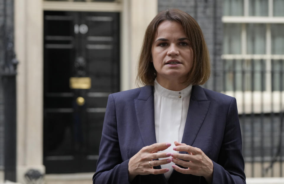 Belarus opposition leader Sviatlana Tsikhanouskaya speaks to the media outside 10 Downing Street after a meeting with the British Prime Minister Boris Johnson in London, Tuesday, Aug. 3, 2021. (AP Photo/Alastair Grant)