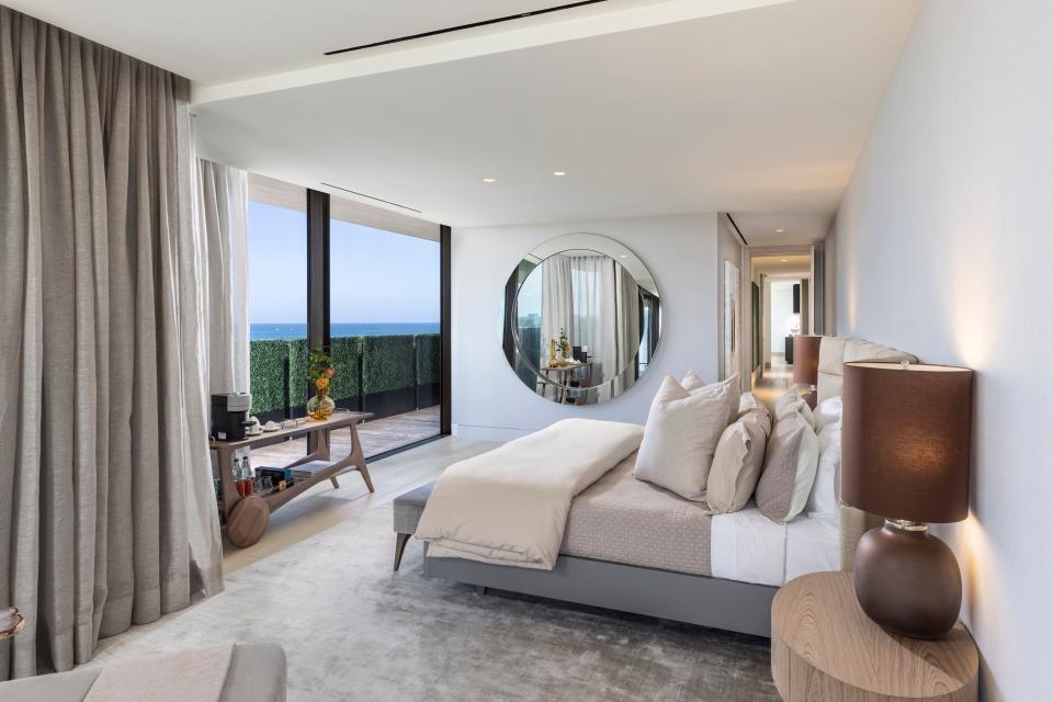 The main bedroom inside the 5,067-square-foot penthouse with views of the ocean.