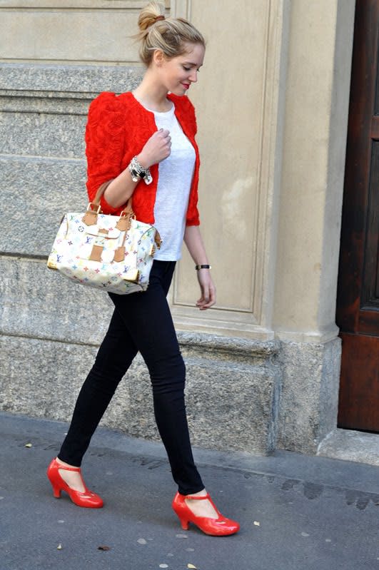 Blogger Chiara Ferragni wearing an H&M sweater and carrying Louis Vuitton’s Speedy Multicolor bag.