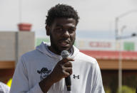 Former New Mexico State NCAA college basketball player Shak Odunewu speaks at a news conference in Las Cruces, N.M., Wednesday, May 3, 2023. Odunewu and former Aggie player Deuce Benjamin, who said they were sexually assaulted by teammates, spoke today about the deep impact their time at the Las Cruces school had on them. (AP Photo/Andres Leighton)