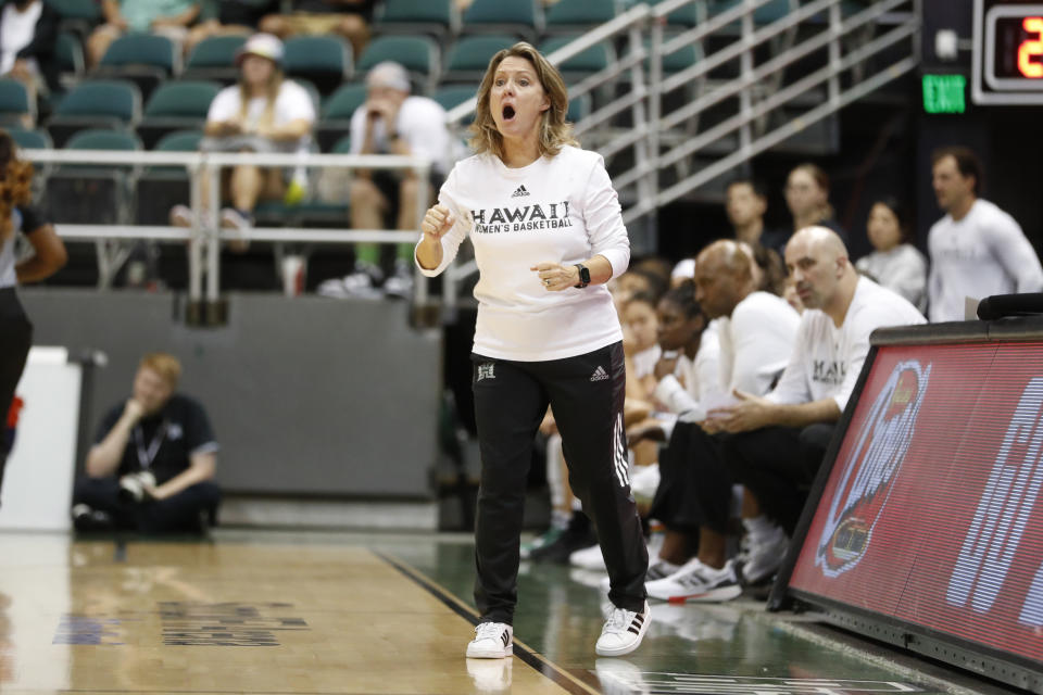 Hawaii head coach Laura Beeman reacts to play as her team takes on Stanford during the third quarter of an NCAA college basketball game, Sunday, Nov. 27, 2022, in Honolulu. (AP Photo/Marco Garcia)