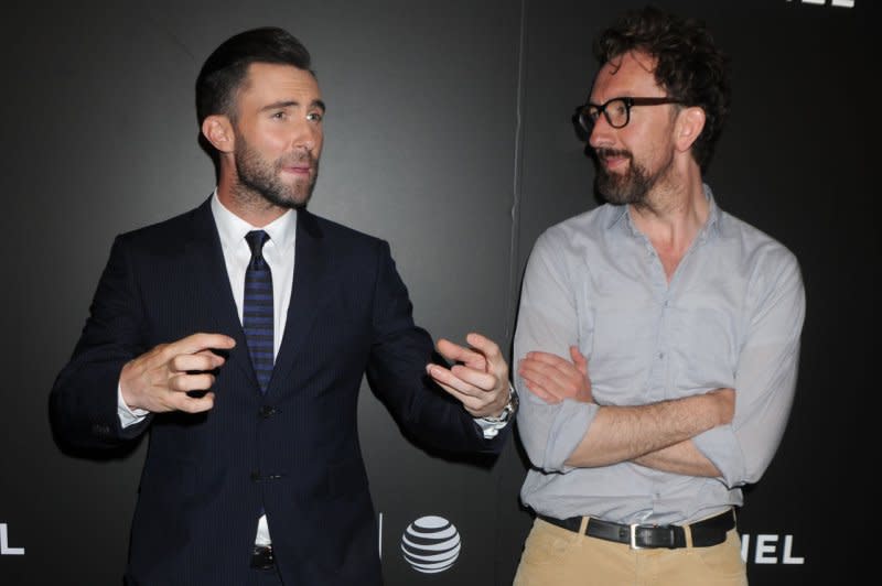 Adam Levine (L) and John Carney arrive on the red carpet at the "Begin Again" closing night premiere at the 2014 Tribeca Film Festival at BMCC Tribeca PAC in New York. File Photo by Dennis Van Tine/UPI