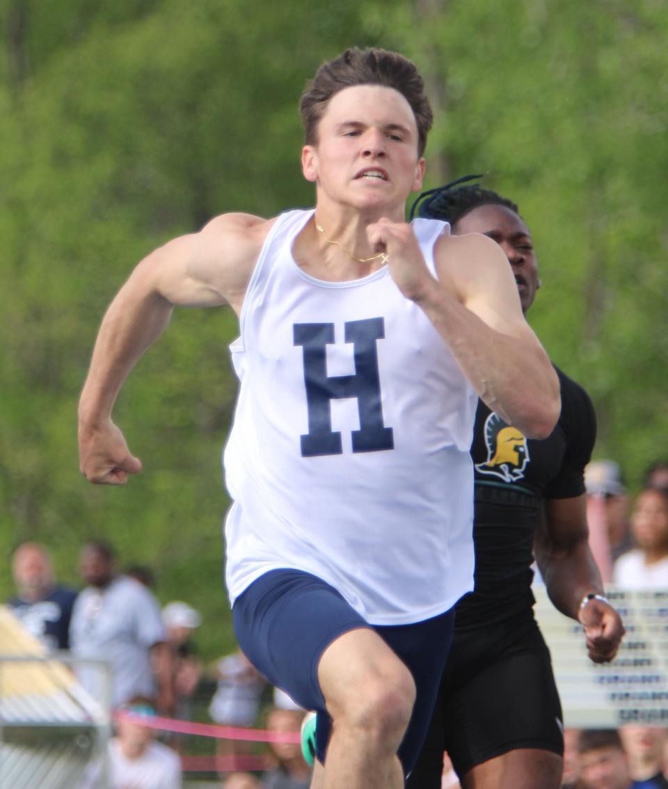 Hartland's Cameron Cheetam wins the 100-meter dash during the Division 1 track and field regional meet Friday, May 17, 2024 at Grand Ledge.