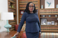 FILE - Judge Ketanji Brown Jackson, who is a U.S. Circuit Judge on the U.S. Court of Appeals for the District of Columbia Circuit, poses for a portrait, Feb., 18, 2022, at the court in Washington. The first Black woman confirmed for the Supreme Court, Jackson, is officially becoming a justice. Jackson will be sworn as the court’s 116th justice at midday Thursday, June 30, just as the man she is replacing, Justice Stephen Breyer, retires. (AP Photo/Jacquelyn Martin, File)