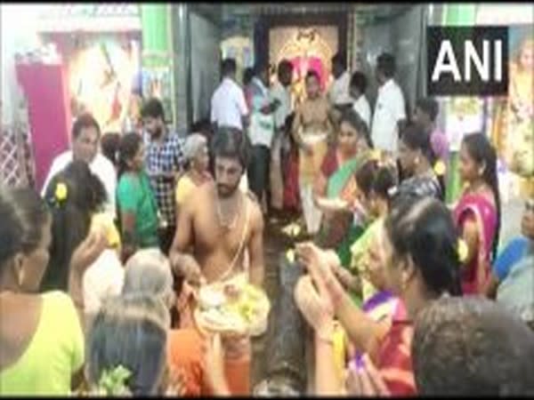 AMMK workers on Sunday offered prayers at a temple in Madurai (Photo/ANI)