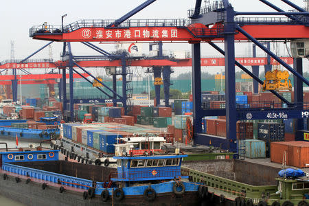 Containers are seen at a port in Huaian, Jiangsu province, China May 5, 2019. REUTERS/Stringer