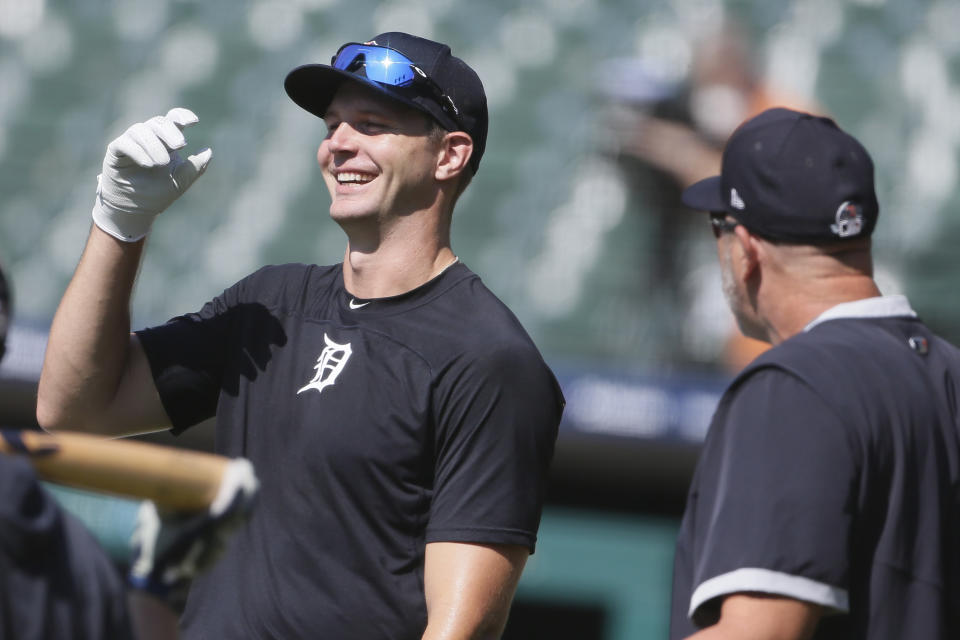 Detroit Tigers' Grayson Greiner laughs at while talking with a coach during baseball training camp at Comerica Park, Friday, July 3, 2020, in Detroit. (AP Photo/Duane Burleson)