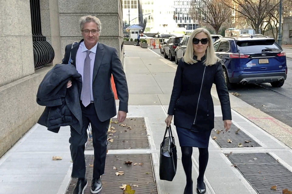 Ghislaine Maxwell's defense attorneys Laura Menninger and Jeffrey Pagliuca arrive at court in New York, on Friday, Dec. 3, 2021. The case against Maxwell stems from four now-adult women who said she recruited them into being sexually abused by Jeffrey Epstein. (AP Photo/Ted Shaffrey)