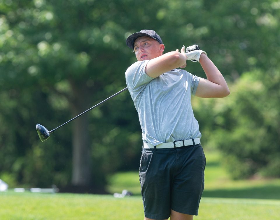 Golfer Braden Herstich hits a ball in the Hudson Junior Invitational at the Country Club of Hudson on June 20, 2024.