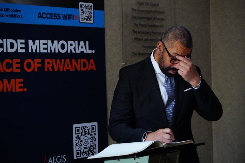 Home Secretary James Cleverly signs a book of condolences at the Kigali Genocide Memorial during his visit to Kigali, Rwanda (Ben Birchall/PA) (PA Wire)