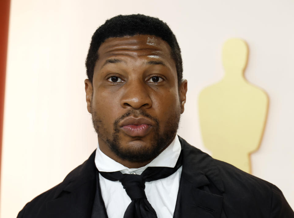 HOLLYWOOD, CALIFORNIA - MARCH 12:  Jonathan Majors attends the 95th Annual Academy Awards on March 12, 2023 in Hollywood, California. (Photo by Mike Coppola/Getty Images)