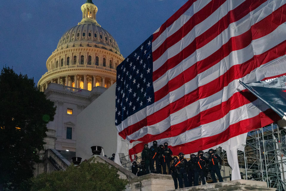 Police stand guard at the U.S. Capitol following riots on Jan. 6.<span class="copyright">Peter van Agtmael—Magnum Photos for TIME</span>