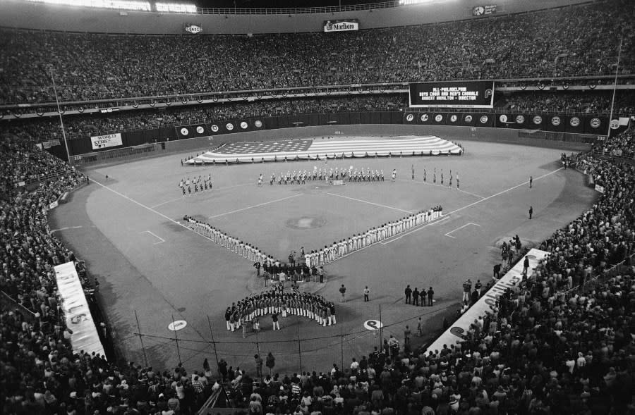 This is the scene in Philadelphia’s Veterans Stadium during ceremonies for the first game of the 1980 World Series between the Philadelphia Phillies and the Kansas City Royals in Philadelphia, Oct. 14, 1980. (AP Photo/Ray Howard)