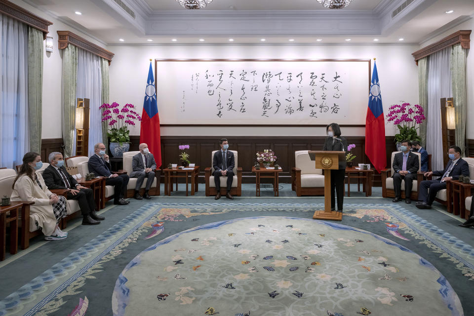 In this photo released by the Taiwan Presidential Office, Taiwan's President Tsai Ing-wen, center right, speaks during a meeting with Swiss lawmakers in Taipei, Taiwan, Monday, Feb. 6, 2023. A group of Swiss lawmakers met with Taiwan's president and said Monday their government wants to deepen political relations, adding to shows of support by foreign politicians for the self-ruled island democracy in the face of Chinese intimidation. (Taiwan Presidential Office via AP)