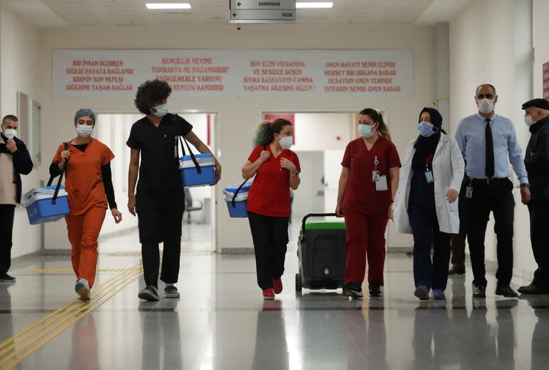 Turkey begins mass COVID-19 vaccinations with health workers, in Istanbul