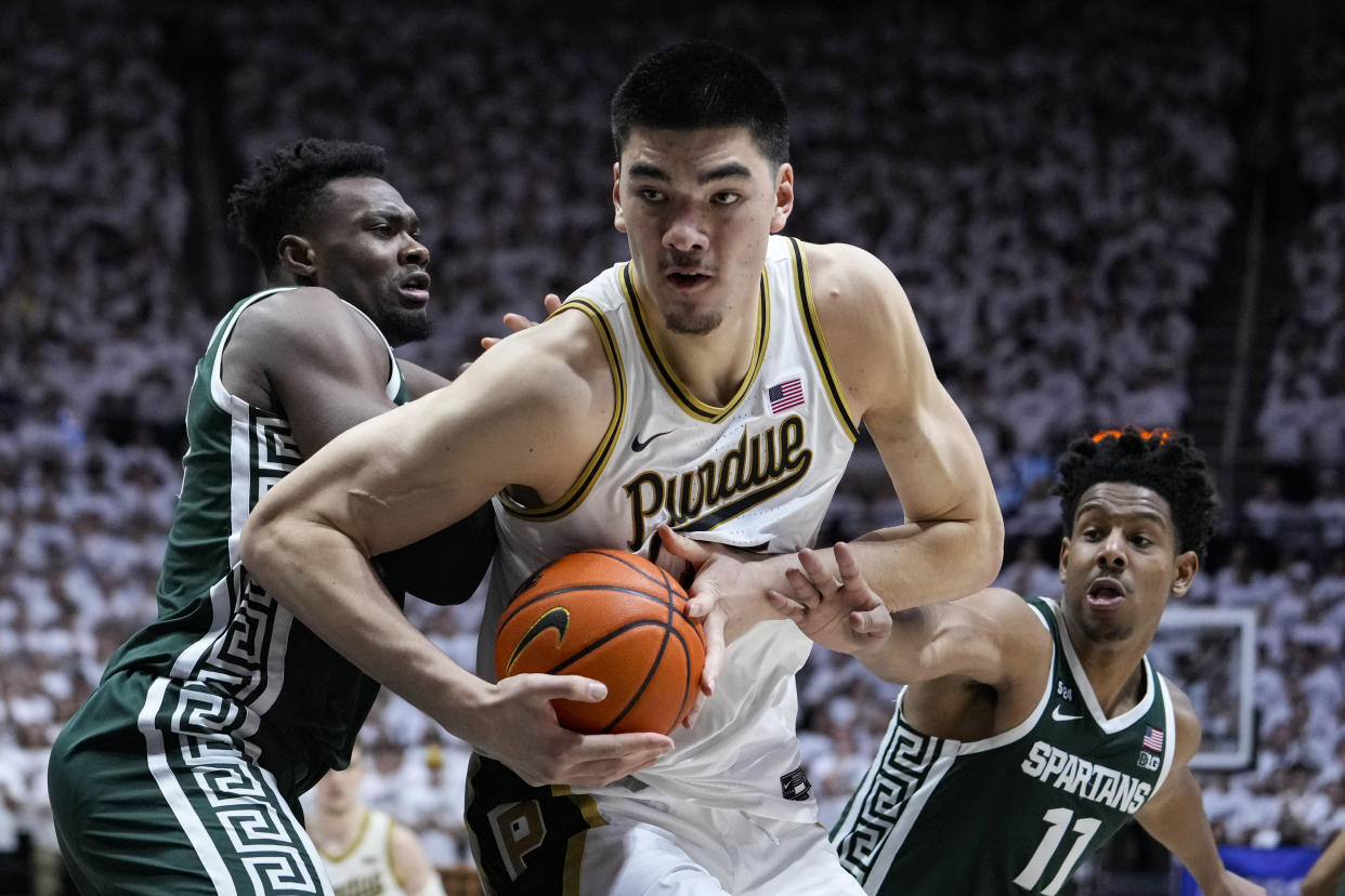 Purdue center Zach Edey (15) is having a monster season for the top-ranked Boilermakers. (AP Photo/Michael Conroy)