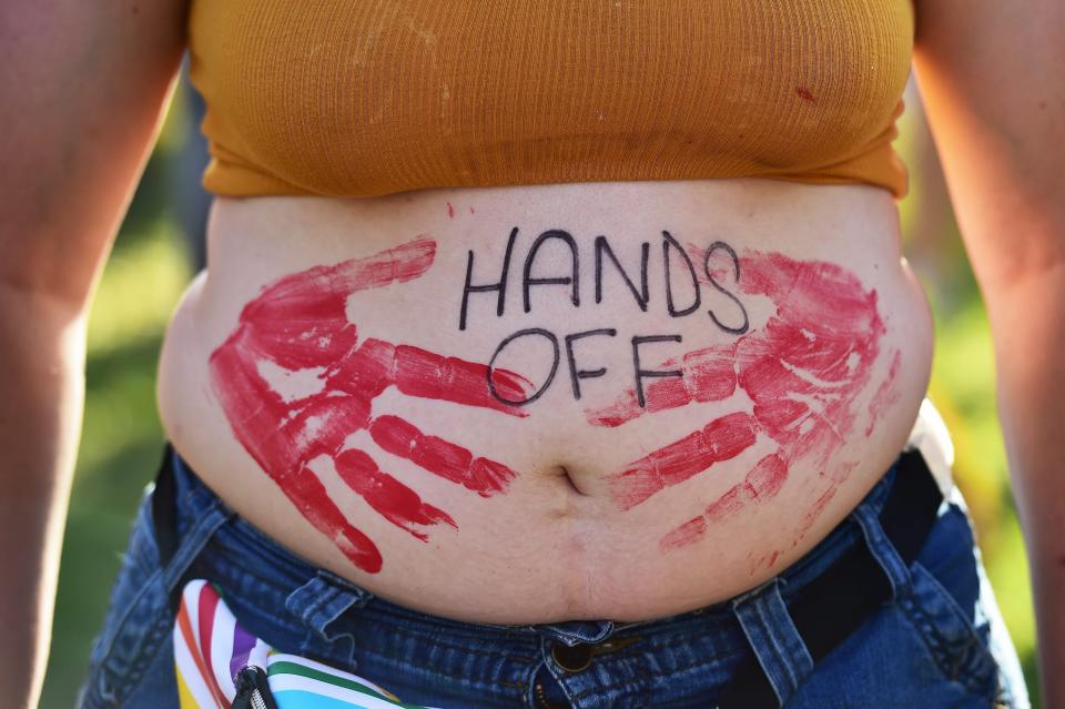 Protesters voiced their opinions about the leaked Supreme Court draft opinion written by Justice Samuel Alito suggesting that the landmark Roe v. Wade ruling that made abortions a constitutional right would be overturned. Around 200 people gathered outside the Duval County Courthouse in Jacksonville, Fla., on May 4, 2022, to express their opposition to the prospect of the abortion protections being lifted. A small group of anti-abortion protesters were also on hand.