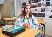 Eight-grader Inka Warro, 14, sits near her English language books at Pohjolanrinne middle school in Riihimaki