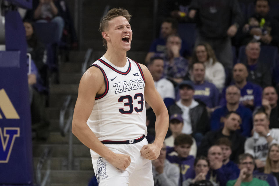 Gonzaga's Ben Gregg reacts after scoring against Washington during the first half of an NCAA college basketball game Saturday, Dec. 9, 2023, in Seattle. (AP Photo/Stephen Brashear)