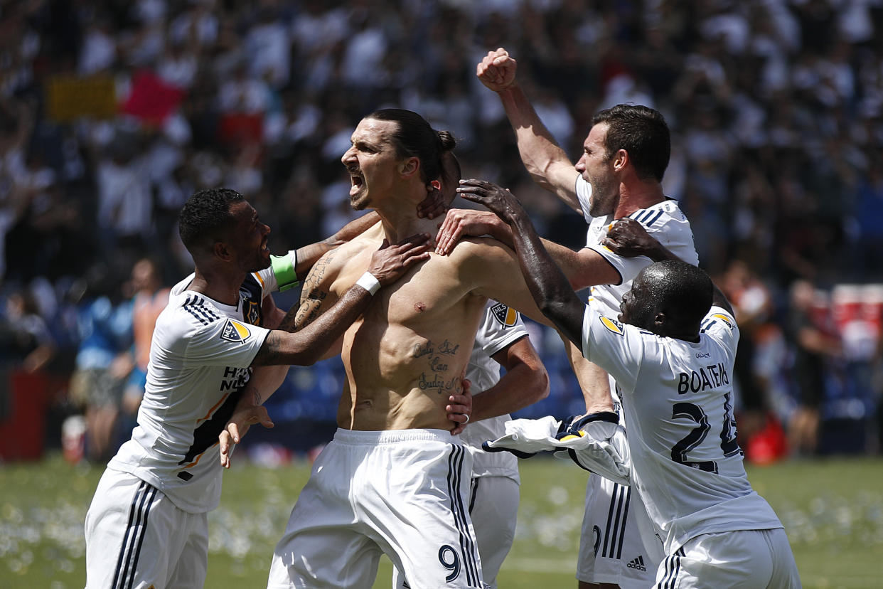 Los Angeles Galaxy’s Zlatan Ibrahimovic and teammates celebrate Ibrahimovic’s first of two goals during the second half against LAFC. The Galaxy won 4-3. (AP)