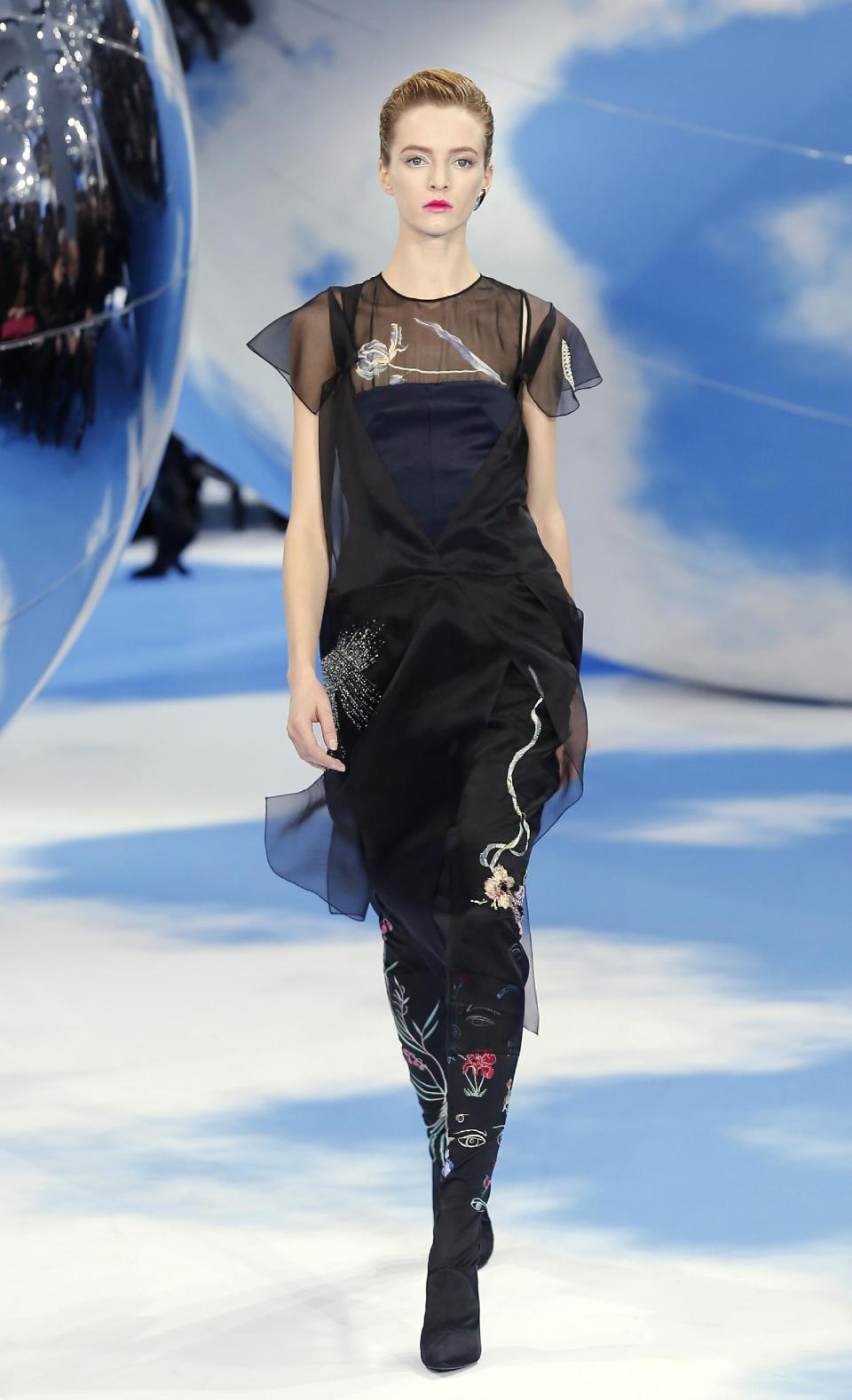 A model wears a creation by designer Raf Simons for Christian Dior's Ready to Wear Fall-Winter 2013-2014 fashion collection, presented, Thursday, March.1, 2013 in Paris. (AP Photo/Jacques Brinon)