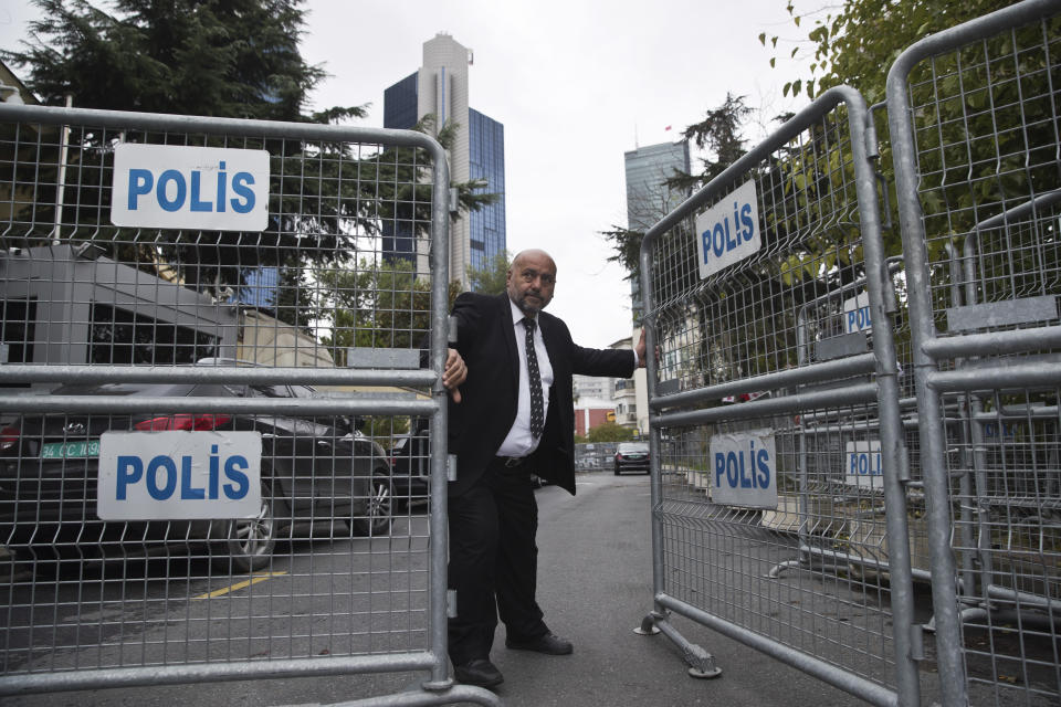 A guard secures the entrance of the Saudi Arabia's Consulate in Istanbul, Wednesday, Oct. 17, 2018. U.S. Secretary of State Mike Pompeo has landed in Turkey Wednesday to discuss the Oct. 2, unexplained disappearance and alleged slaying of Saudi writer Jamal Khashoggi with authorities.(AP Photo/Petros Giannakouris)